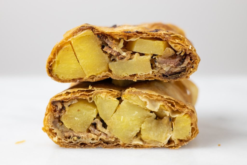 Potato Bacon Rétes at the Bakehouse. Flaky, filled Hungarian pastry for breakfast, lunch, or dinner.