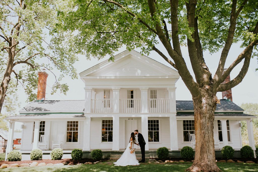 Wedding and Cornman Farms in front of Farm House